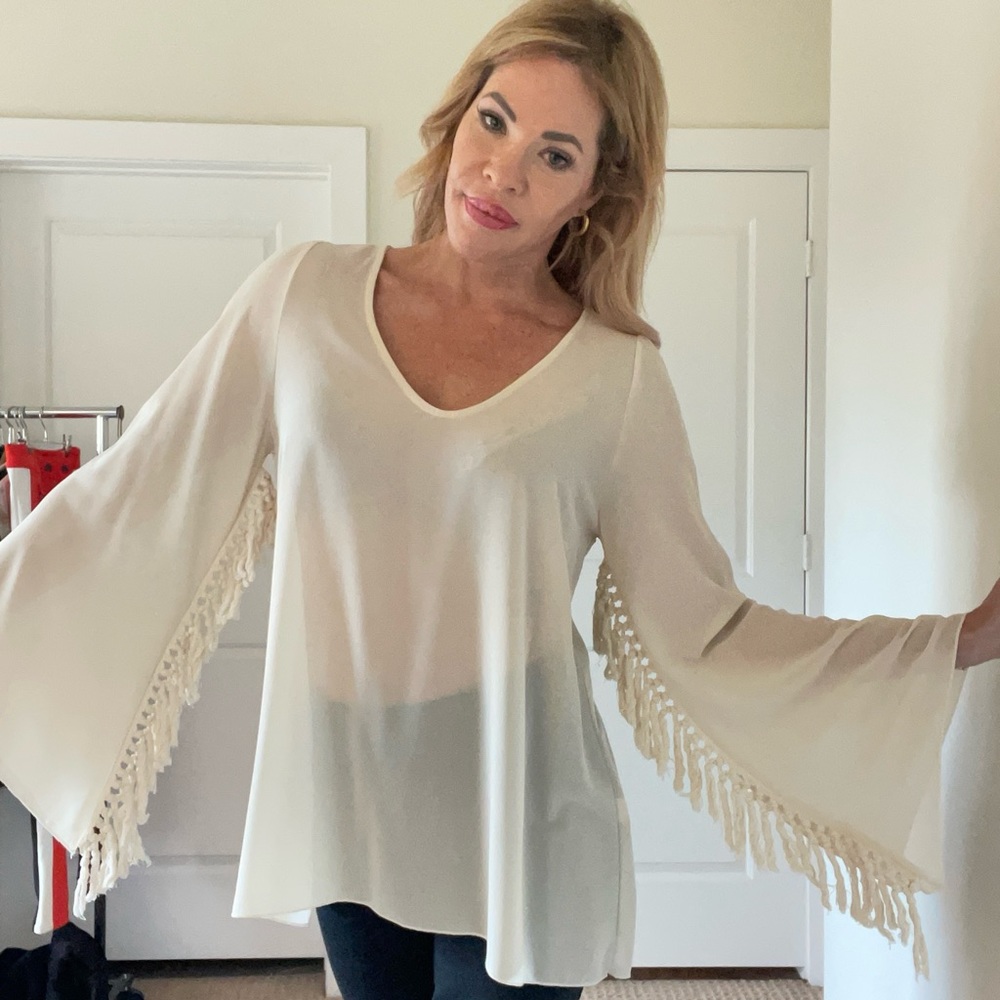 Fun fringed sheer top!